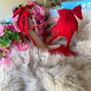 Striking Red Stiletto Heels with Bow Detail